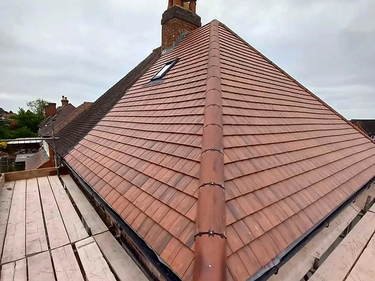 Clay plain tile re-roof with a Velux roof window