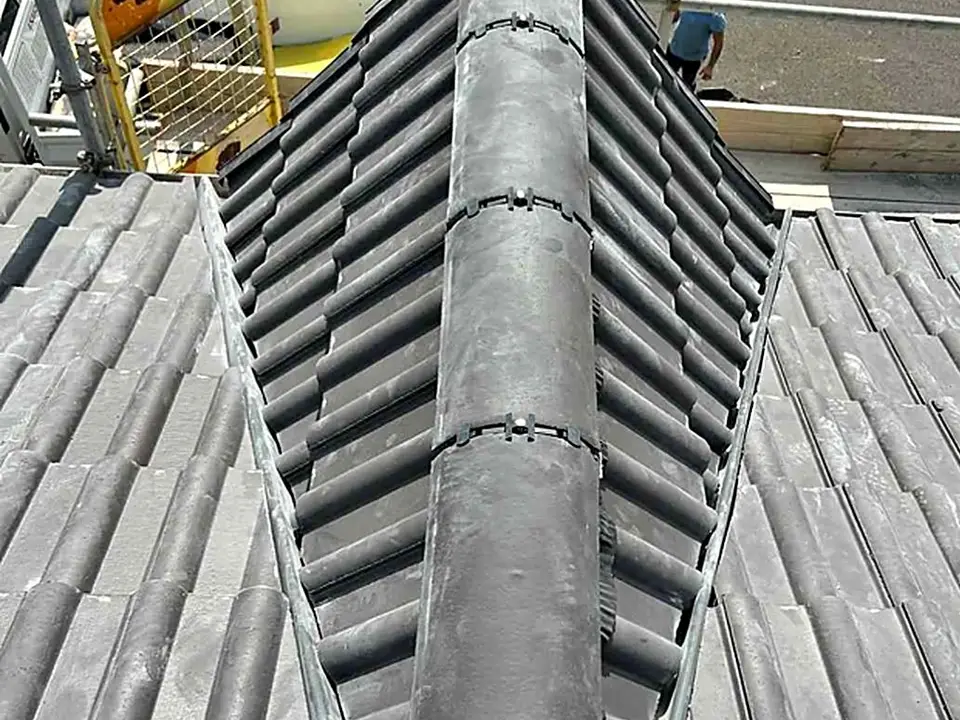 Concrete tile re-roof under way with scaffolding