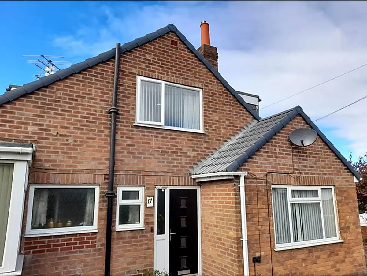Front of a house with a concrete tile re-roof