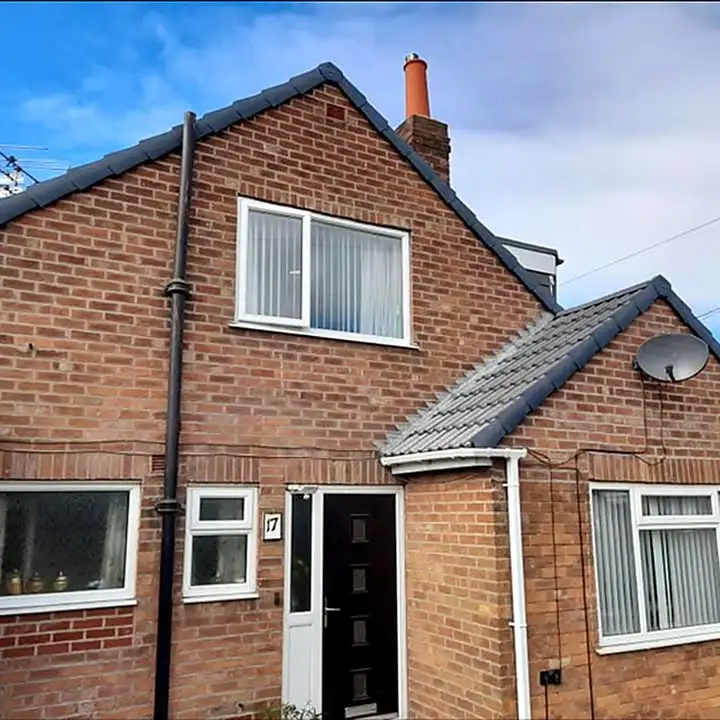 Front of a house with a concrete tile re-roof