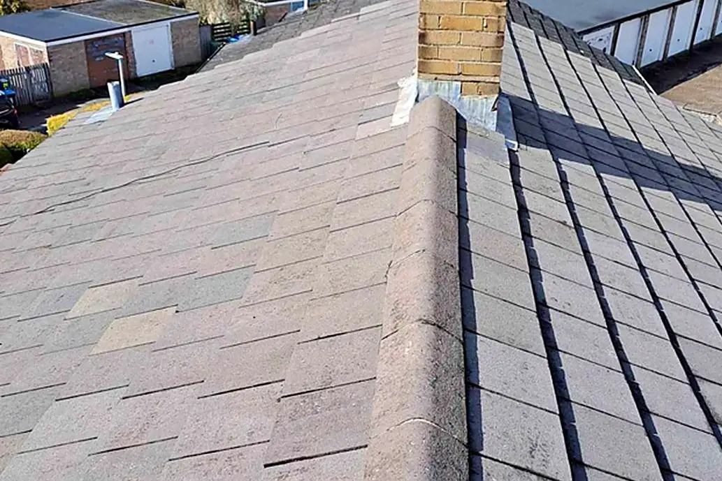 Worn roof before repair